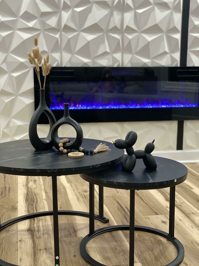 Black modern table with black decorations on it