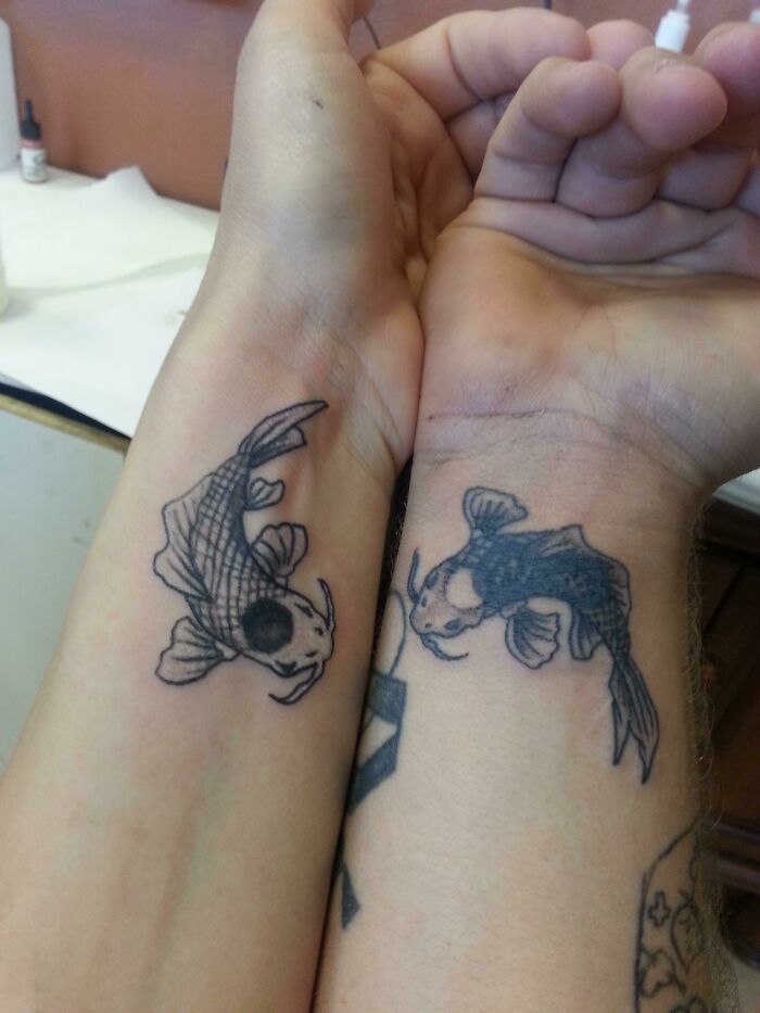 couple Wrists tattoo with fish