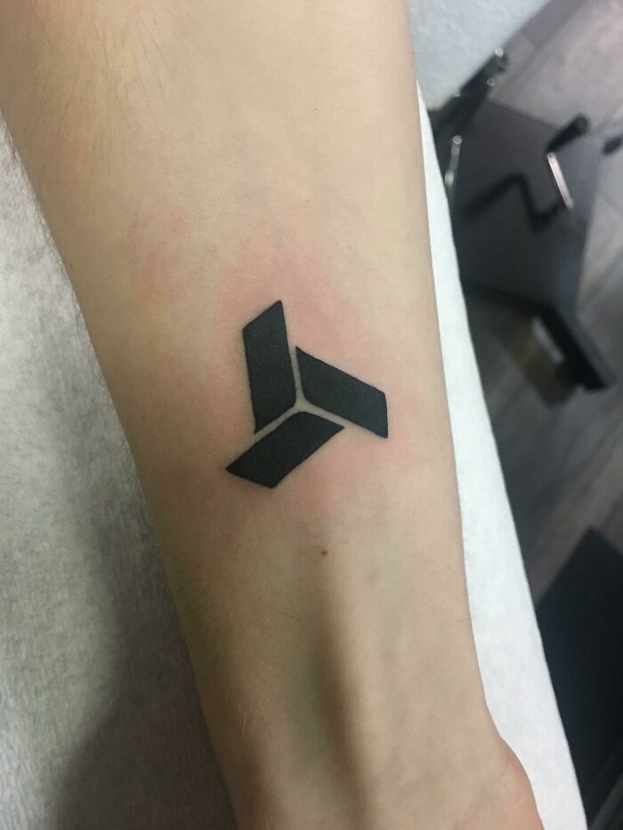 Sign tattoo on wrist