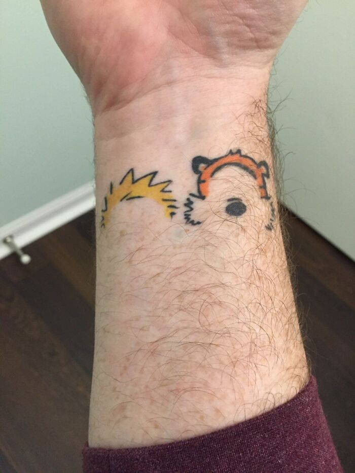 Calvin And Hobbes Wrist Tattoo