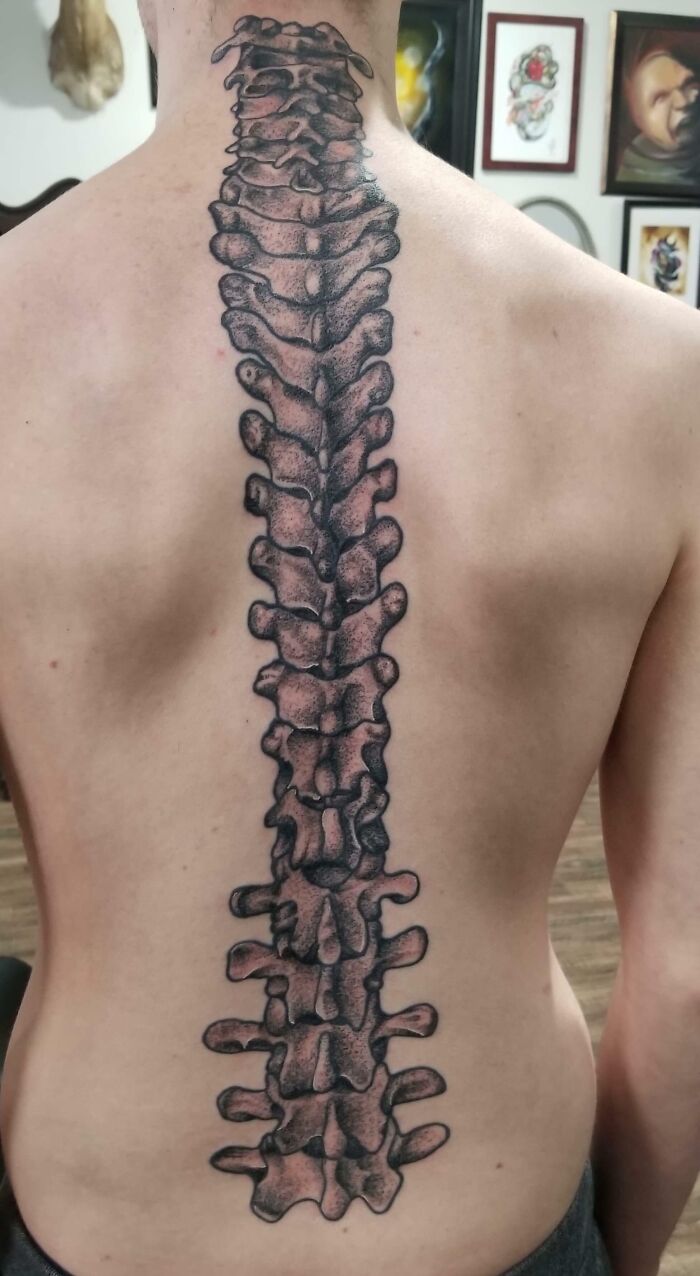 Spine bone tattoo 