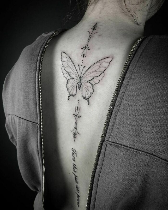 Sleek Lines, Butterflies, And Inspiring Quote Spine Tattoo