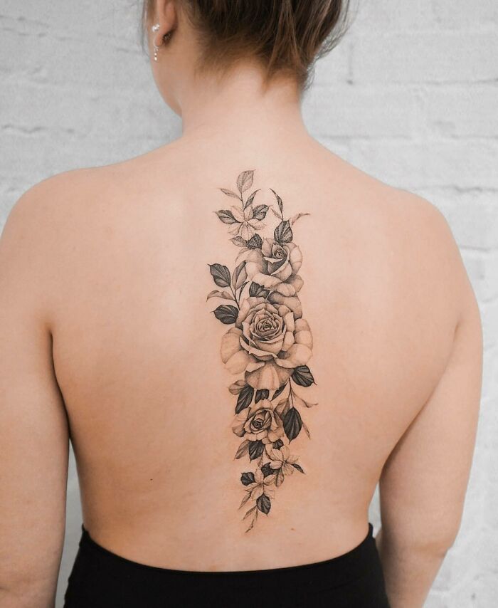Roses on the back tattoo 