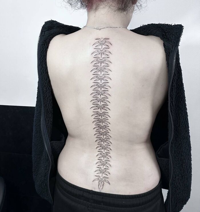Neo Tribal Spine Tattoo