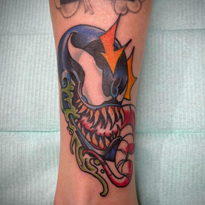 Venom with tongue Tattoo 