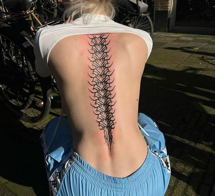 Black Tribal Spine Tattoo