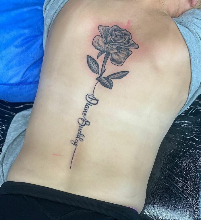Rose on the back tattoo 