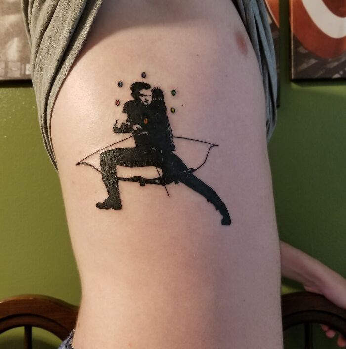 Hawkeye with bow tattoo 