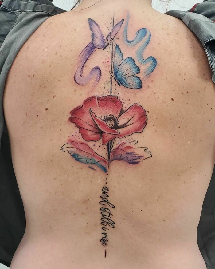 Poppy flower with butterflies tattoo 