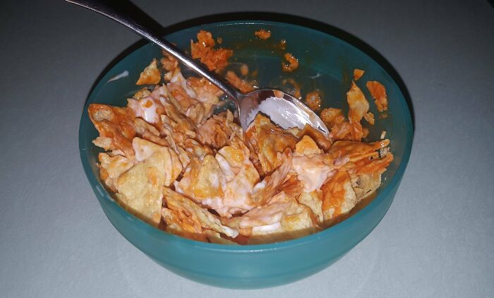 All My Chips Were Dust Or Too Small To Dip. So I Put On Some Hot Sauce And Sour Cream, Stirred It Up, And Ate It With A Spoon