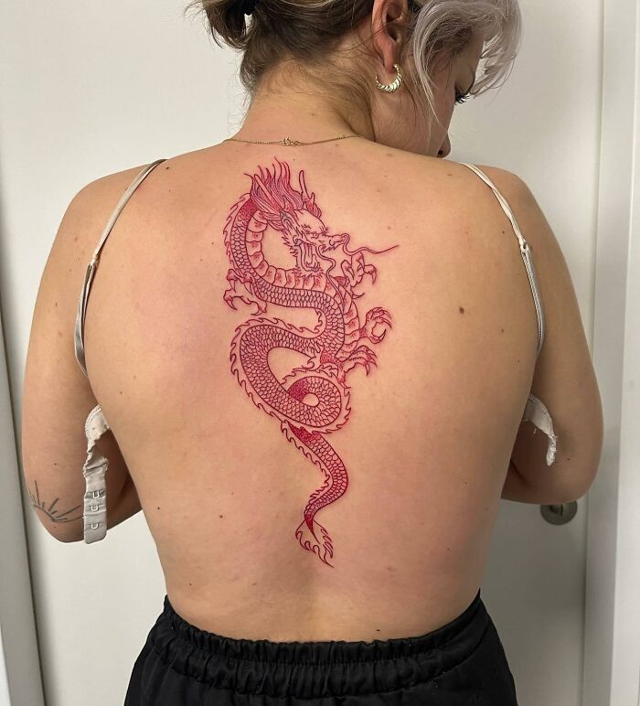 Red dragon spine tattoo 