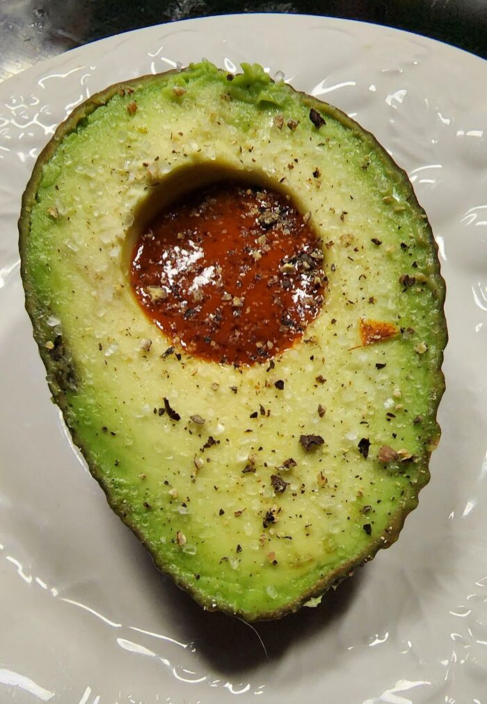 How Do You Like Your Avocados? We Like To Put Valentina Hot Sauce In The Hole With Salt And Pepper. So Simple And Delicious