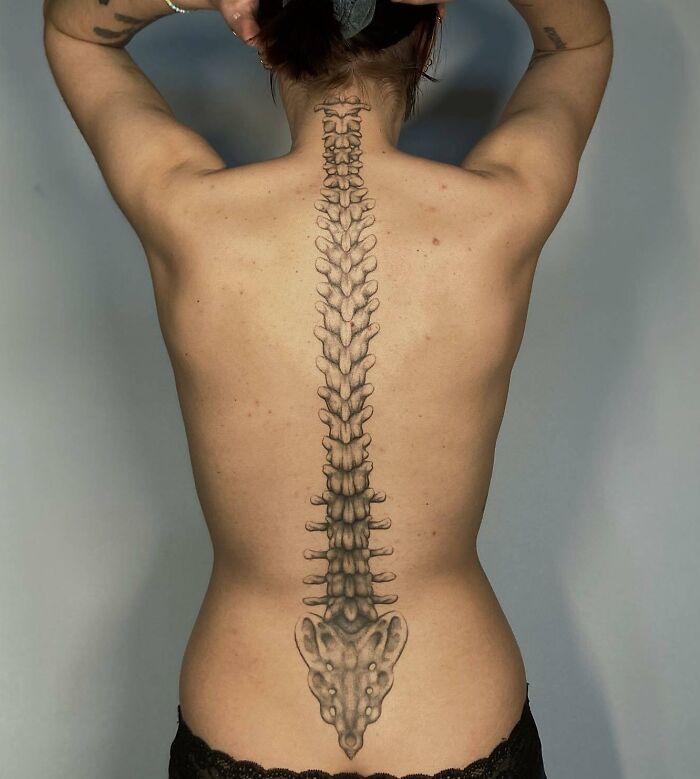 Spinal cord bones tattoo 