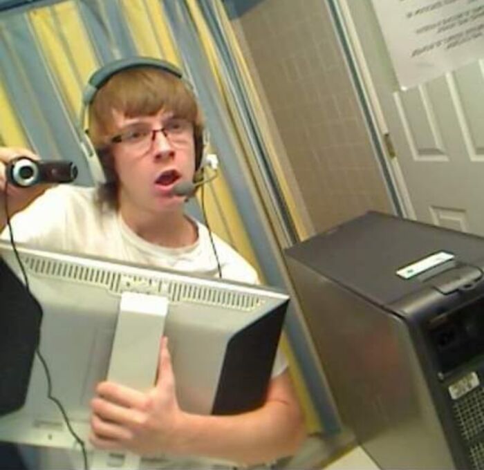 Man taking a picture with a computer camera 