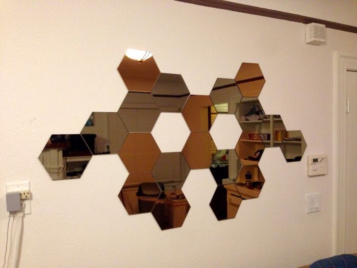 Hexagon mirror in a living room 