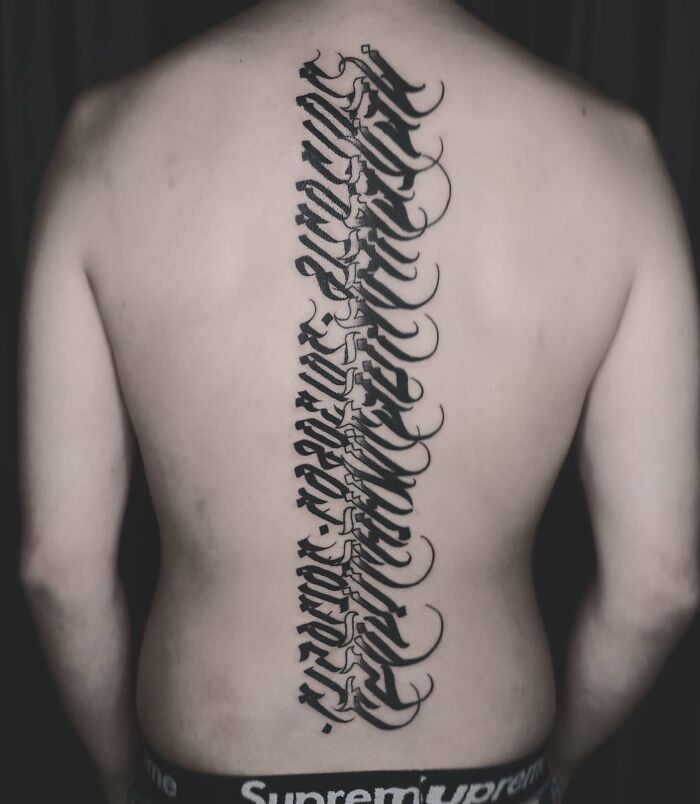 Gothic Calligraphy Tattoo