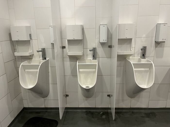 Combined Urinal/Sinks. The Used Sink Water Drains Into The Urinal