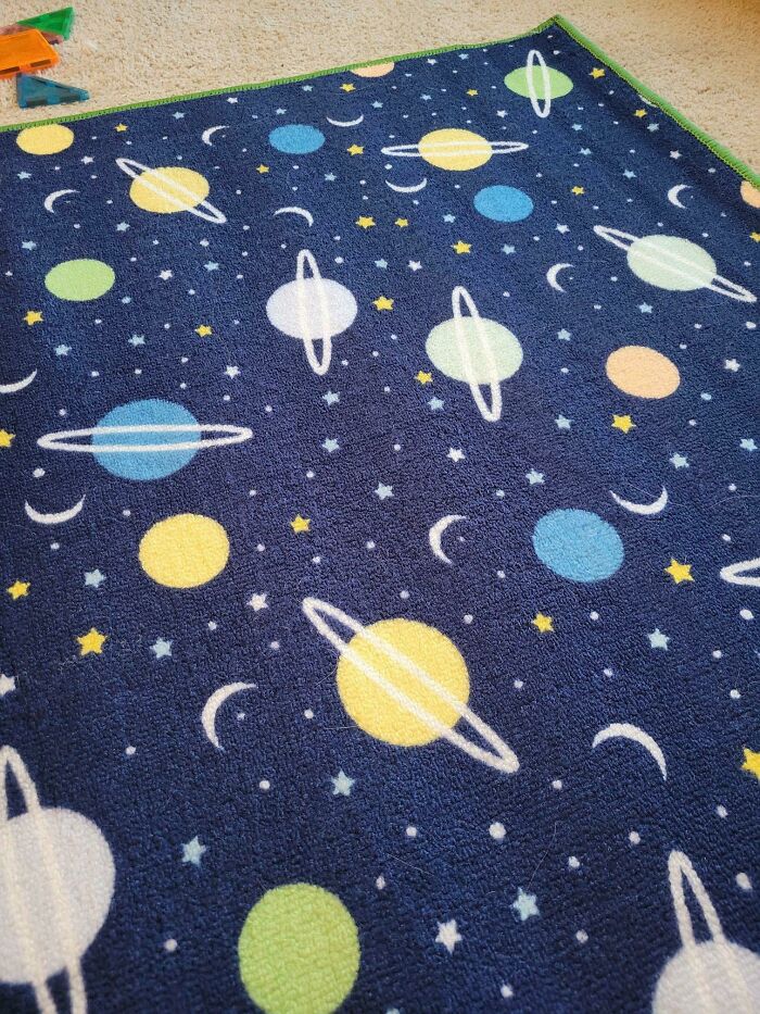 The Planets On My Son's New Rug Have Rings That Don't Go Around The Planet