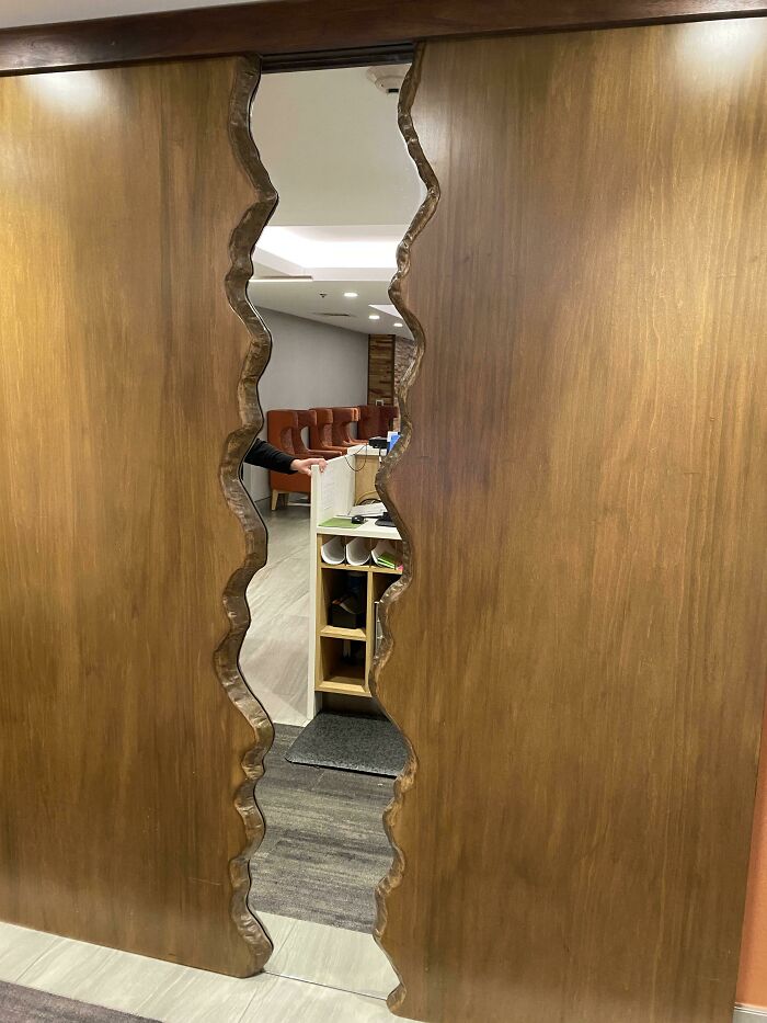 Interesting looking mirror inside an office 