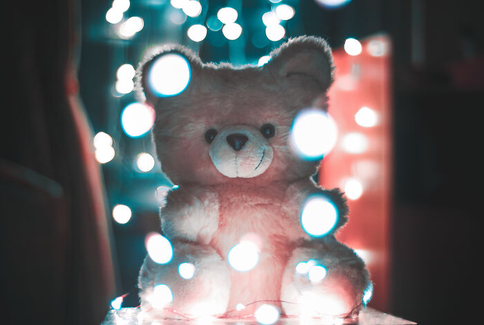 A teddy bear with lights on it 
