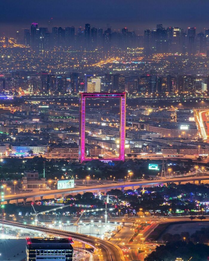Dubai Frame. Taken From The Top Of Burj Khalifa. The Towers In The Background Are Sharjah Emirate