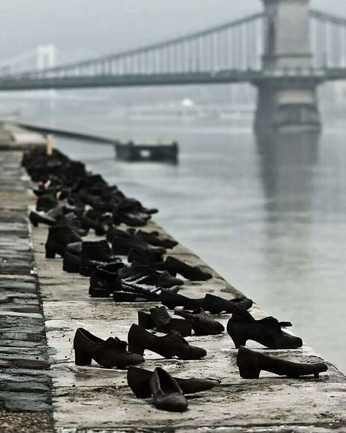 During Wwii, Jews In Budapest Were Brought To The Edge Of The Danube, Ordered To Remove Their Shoes, And Shot, Falling Into The Water Below. 60 Pairs Of Iron Shoes Now Line The River's Bank, A Ghostly Memorial To The Victims