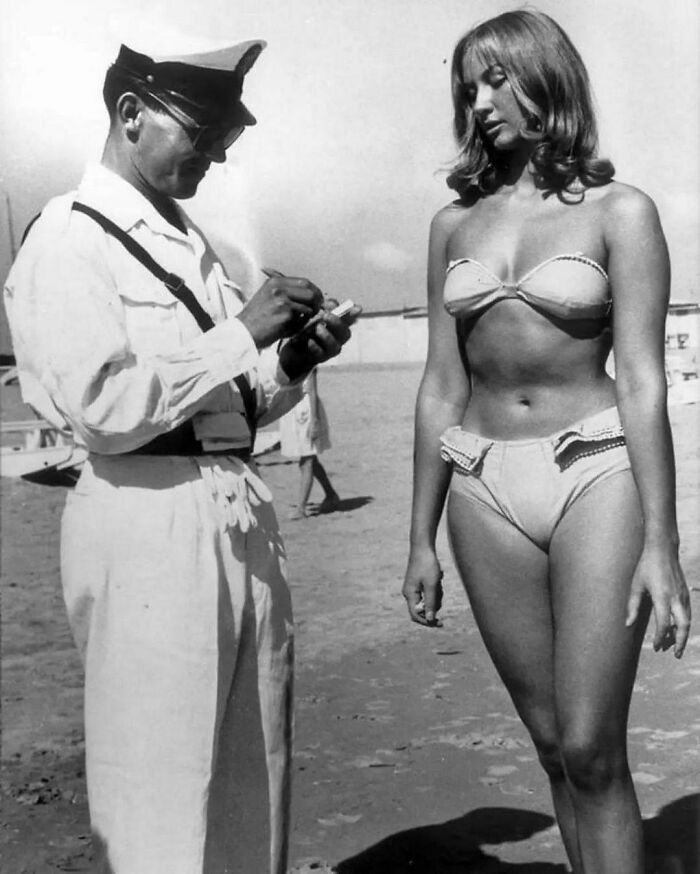 A Policeman Issues A Ticket To A Woman For Wearing A Bikini, 1957
