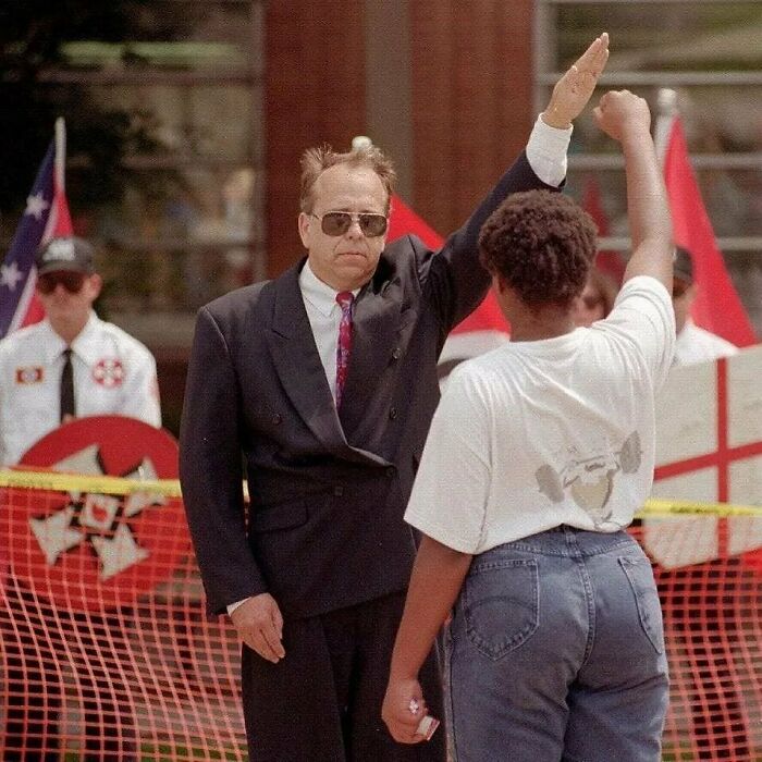 Evil Meets Power, 1996 A Black Women Salutes A Kkk Member With A Closed Fist, Which Is A Symbol Of Black Resistance Against Racism And Oppression