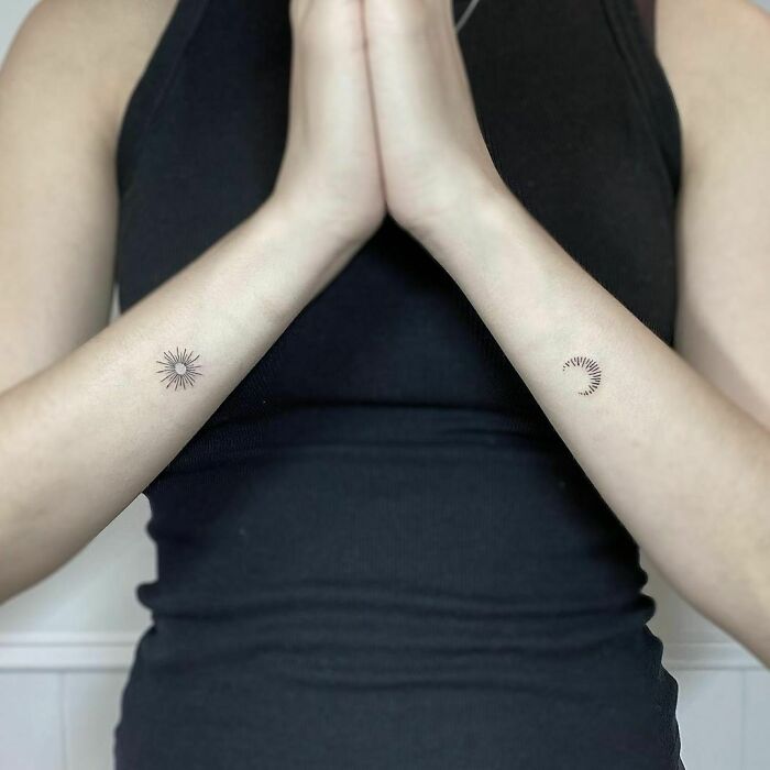 Sun and moon wrists tattoos