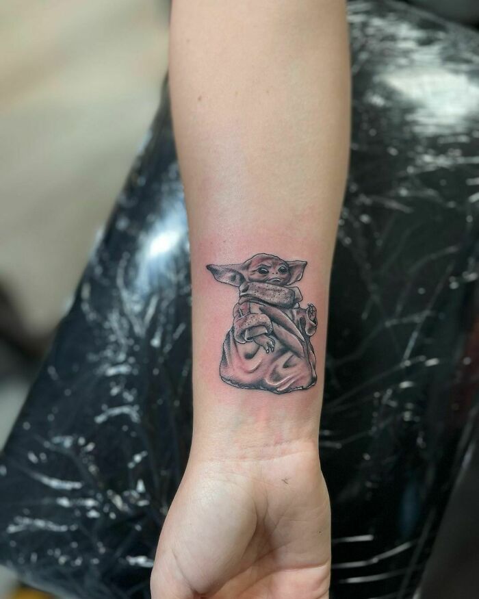 Baby Yoda wrist tattoo