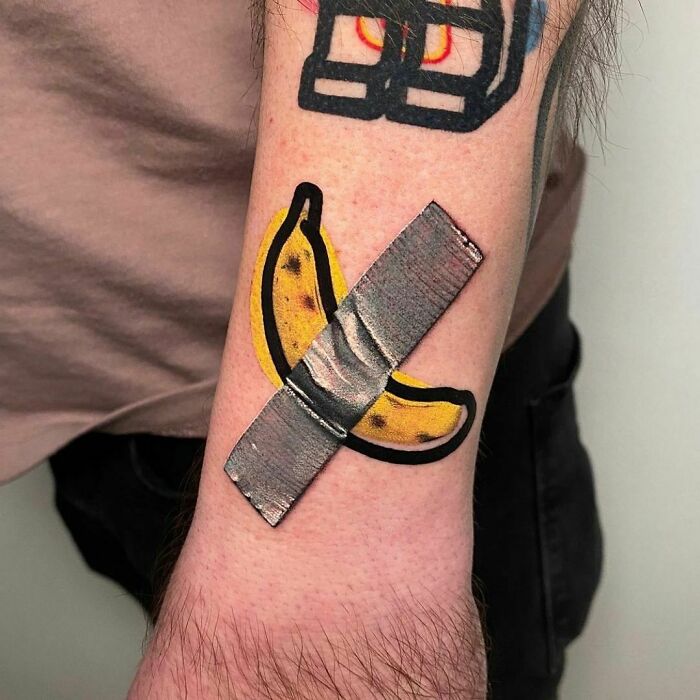 Crossed banana wrist tattoo