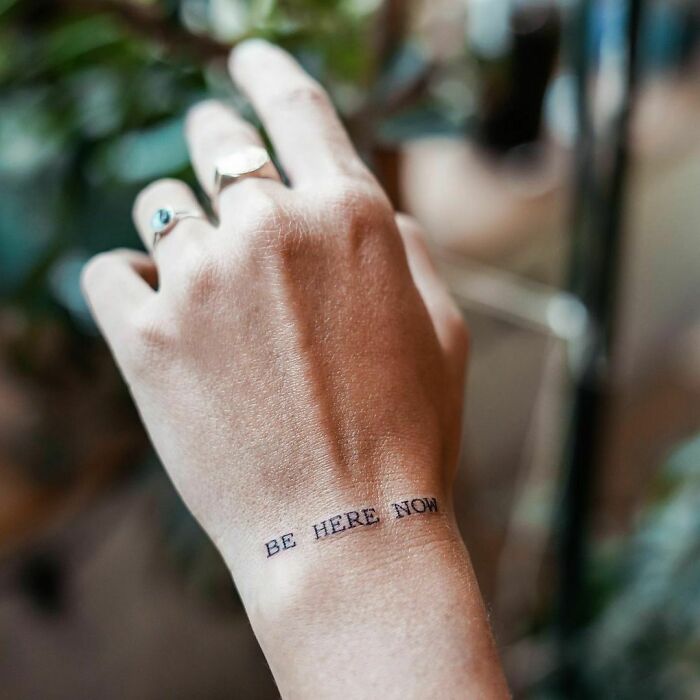 phrase tattoo on wrist