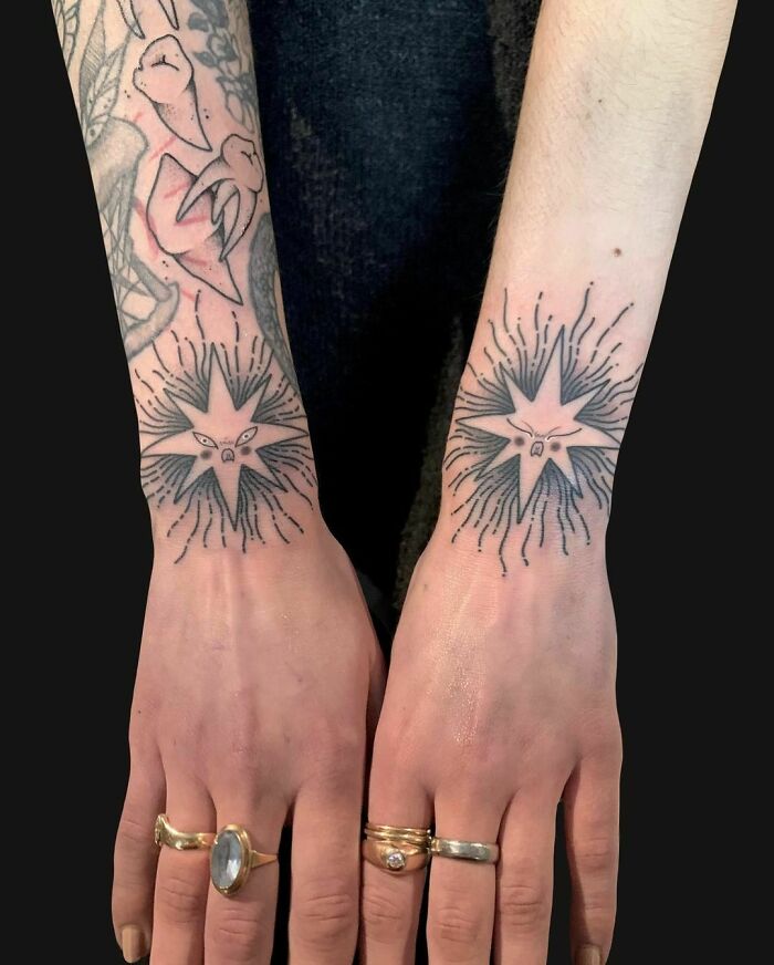 Stars tattoos on wrists