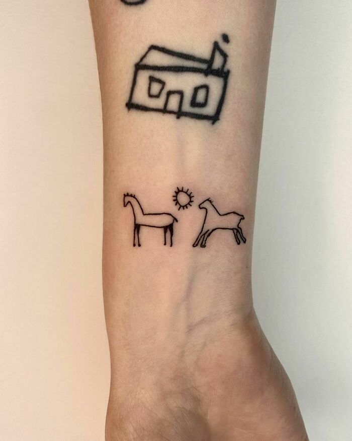 Two little horses running tattoo