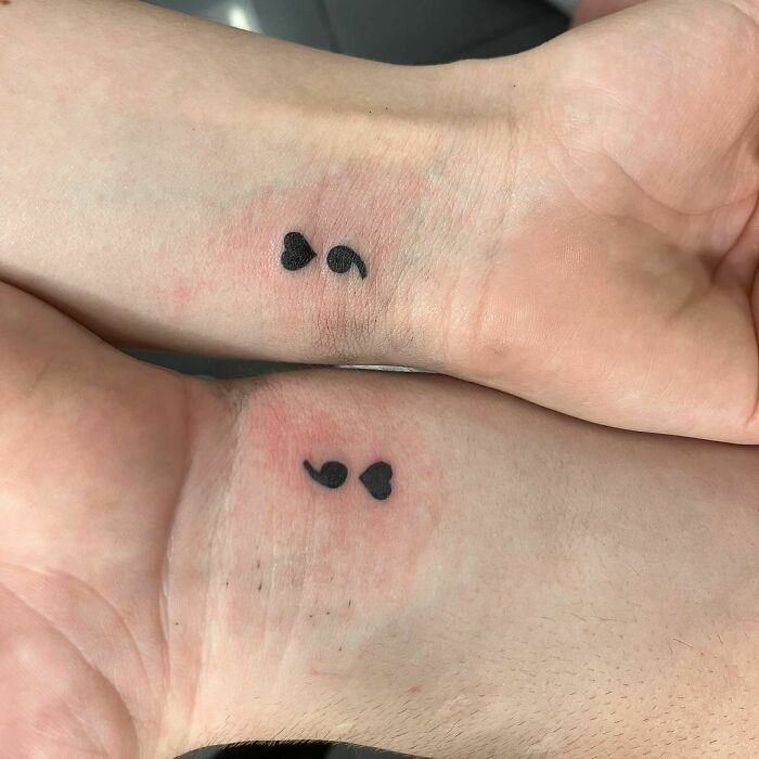 Couple sign Tattoos on wrists