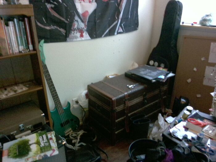 My Music Corner. It Has: All Of My Vinyls, My Bass Guitar, My Guitar, My Record Player, My Amp, A Few Posters, The Green Day Potatoes, And My Sewing Stuff