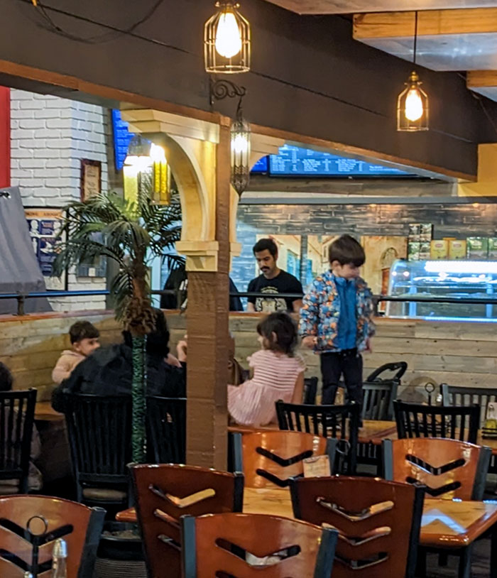 Parents At The Restaurant Allowing Their Children To Walk On The Table. Also Saw Them Sticking The Salt Shaker In Their Mouths