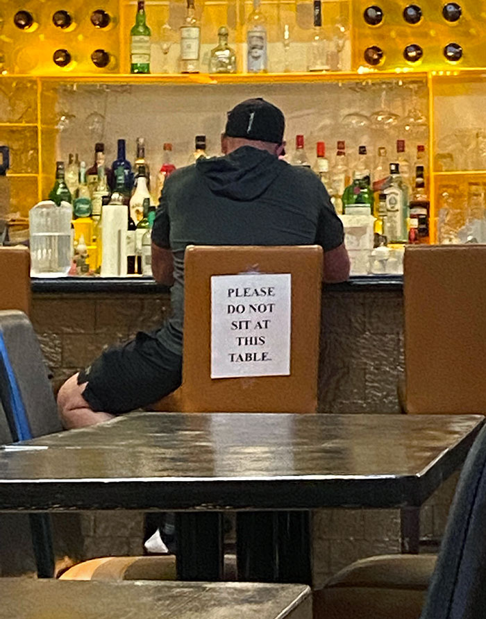 The Only Table In This Restaurant That Has A Sign