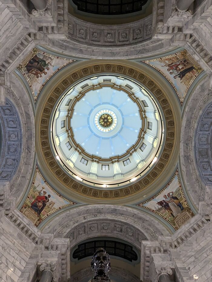 The Dome Of Kentucky's Statehouse In Frankfort Above A Statue Of Abraham Lincoln