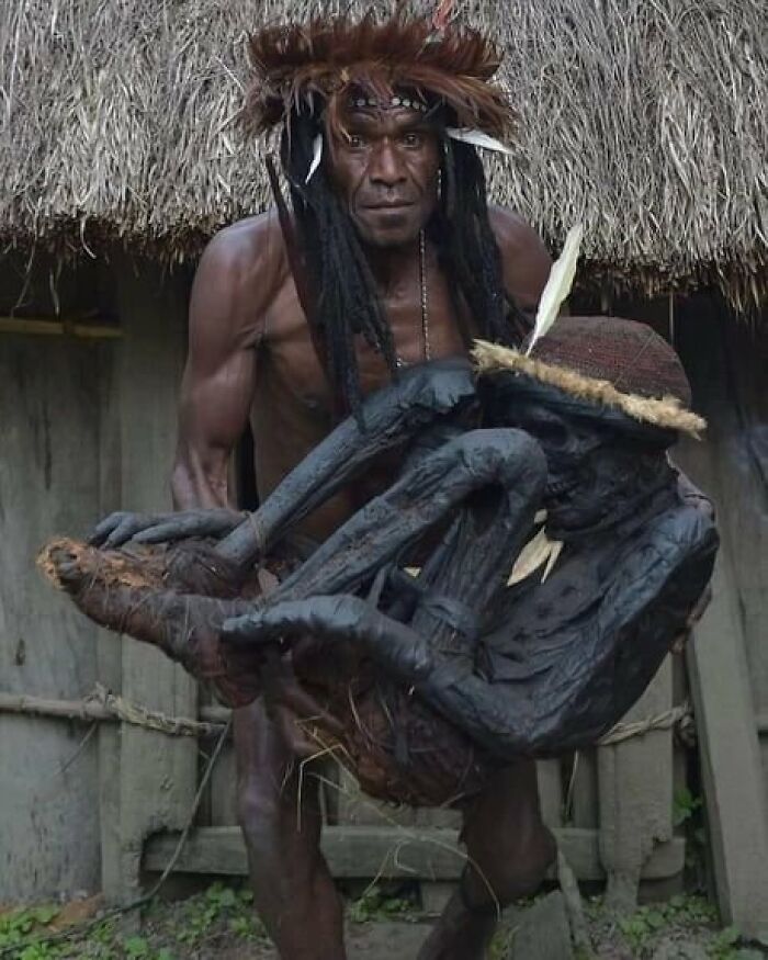 Tribal Chief Eli Mabel Holds The Body Of His Ancestor, Agat Mamete Mabel. Agat Mamete Mabel, Was A Tribal Chief Who Ruled A Remote Village In Papua, Indonesia Some 250 Years Ago