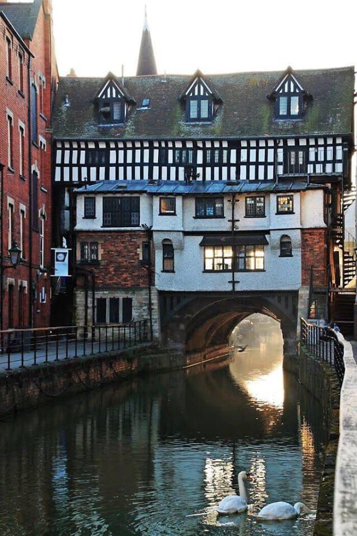 This Medieval Stone Arch Bridge, One Of The Oldest In England, Crosses The River Witham In The Historic City Of Lincoln