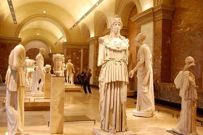 Ancient Greek Statues In The Louvre Museum In Paris, France