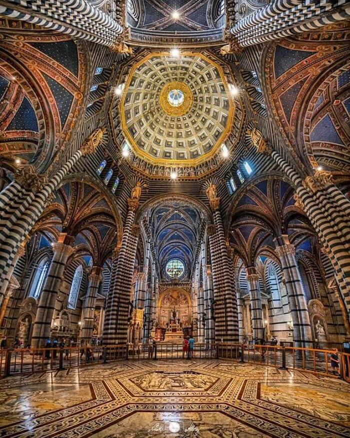 Siena Cathedral In Tuscany, Italy, Was Built Between 1196-1215. Its Famous Interior Is Done Up In Alternating Stripes Of Black And White Marble