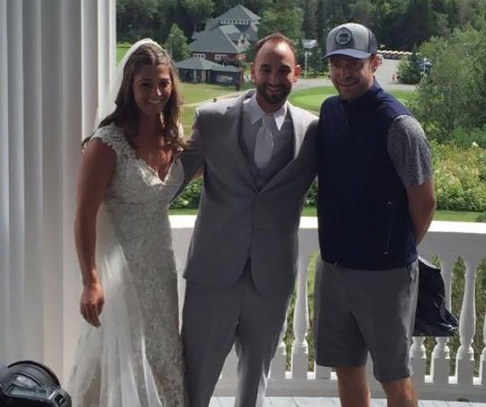Newlyweds Were Snapping Photos Before The Reception When Justin Timberlake Showed Up, Seemingly Out Of The Blue, To Snap A Photo With The Happy Couple
