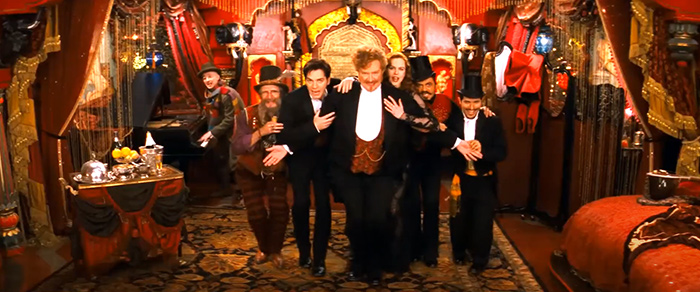 Characters from Moulin Rouge are dancing
