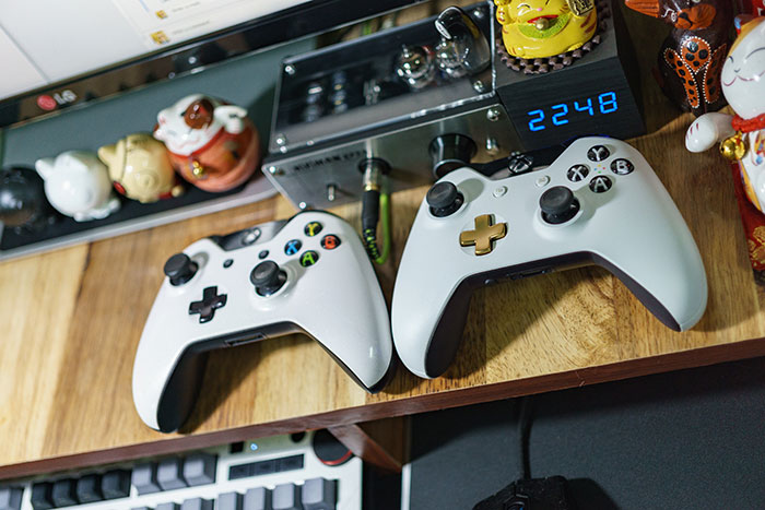 White Xbox controllers on table