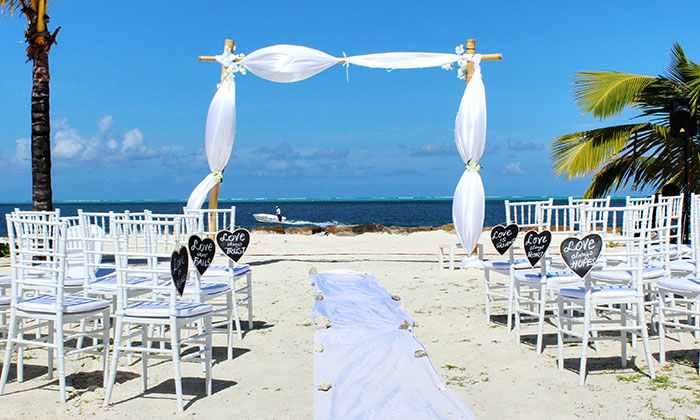 White chairs in the beach near the ocean