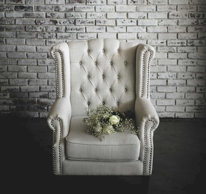 Picture of white sofa with flower