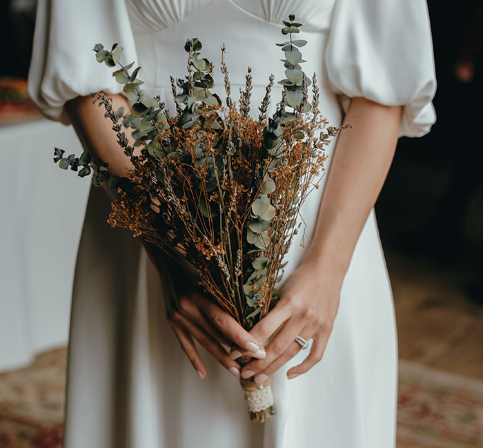 Bride holding flowers