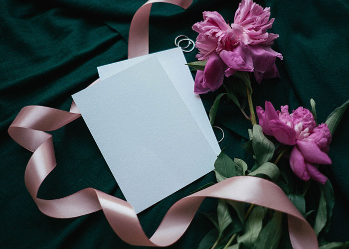 White paper cards with flowers